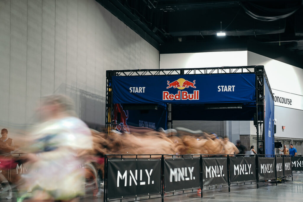 HYROX athletes launching from the Red Bull-branded start line at the 2025 World Championships