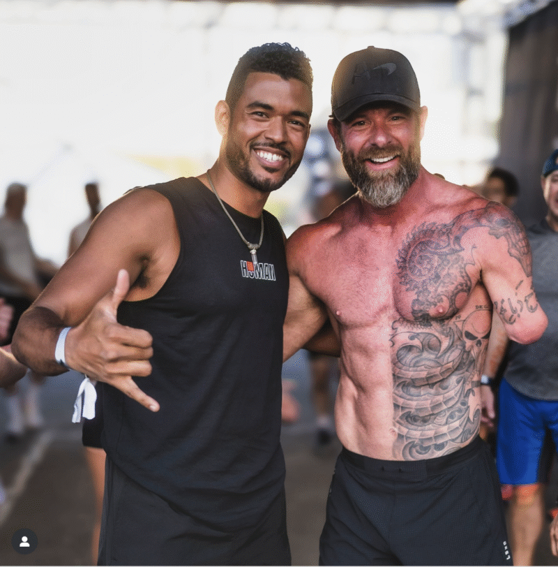 "Two HYROX Adaptive athletes smiling after competition at the 2025 World Championships in Chicago."