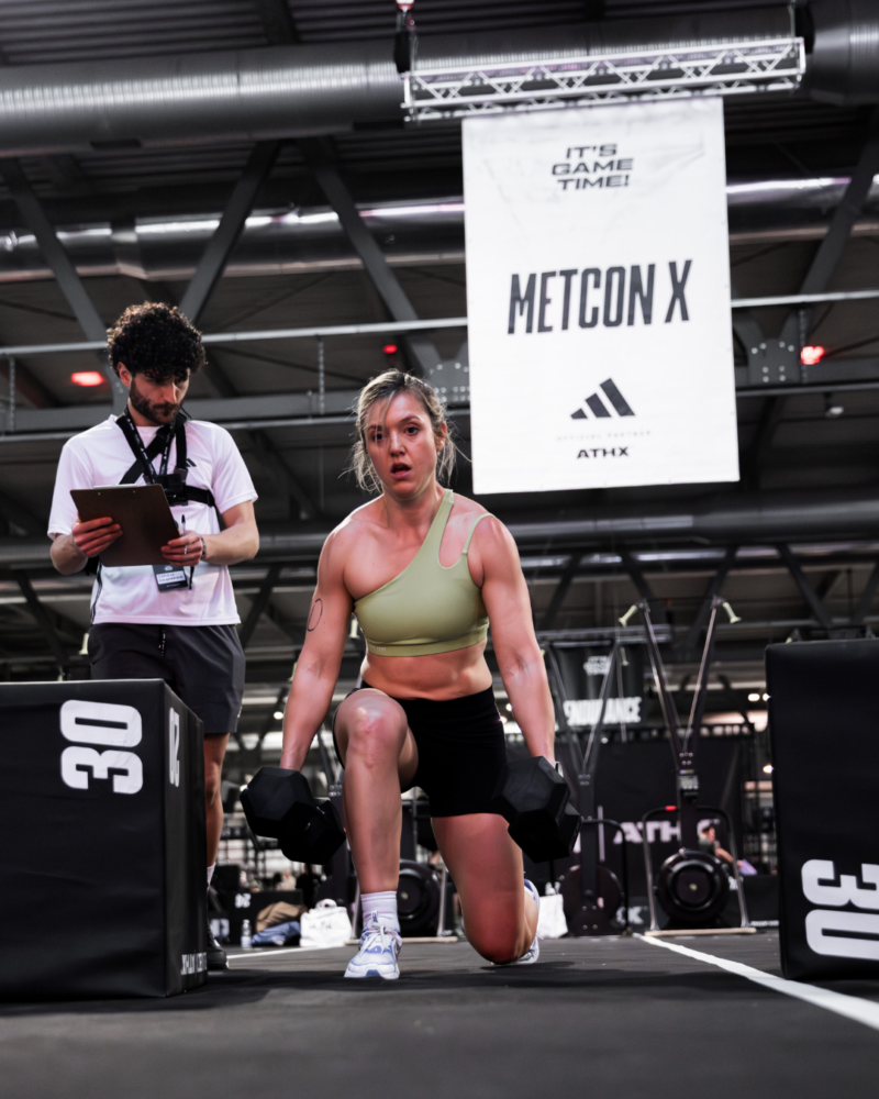 Athlete competing in the Metcon X zone during an ATHX fitness racing event